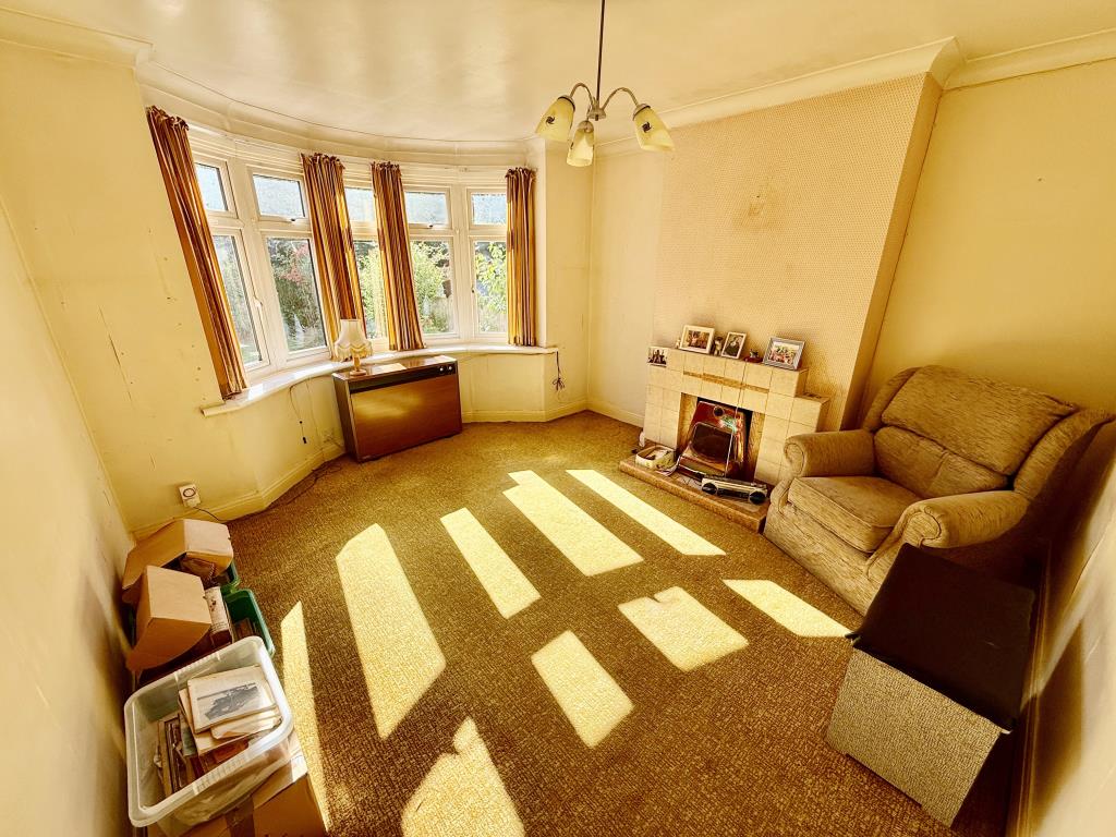 Lot: 172 - THREE-BEDROOM SEMI FOR IMPROVEMENT - Living room with bay window